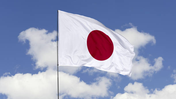 japan flag is waving against in the sky. - japan flag japanese flag white imagens e fotografias de stock