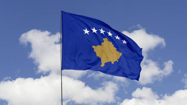 istock Kosovo Flag is Waving Against in the Sky. 1690837614