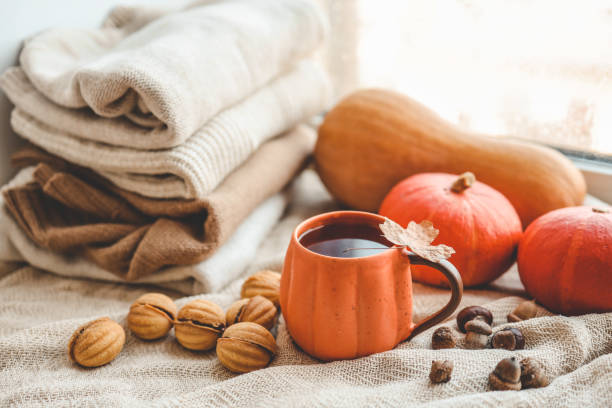 istock Cup of hot tea and a leaf, autumn mood 1690850906