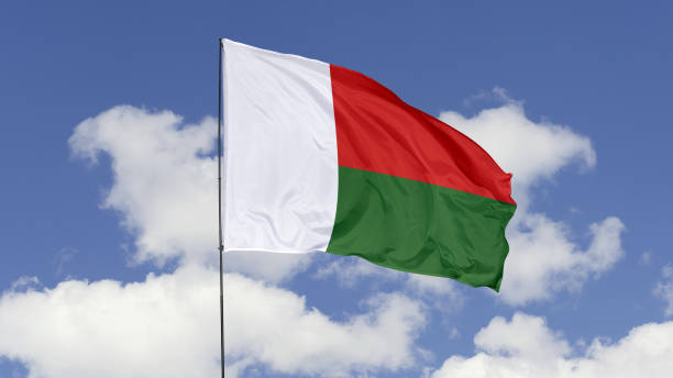 istock Madagascar Flag is Waving Against in the Sky. 1690857104