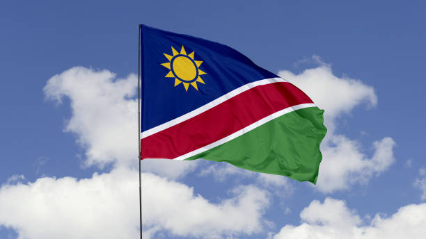 istock Namibia Flag is Waving Against in the Sky. 1690858228
