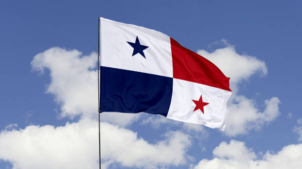 Panama Flag is Waving Against in the Sky. 3d illustration flag of Panama. Panama flag isolated on the blue sky. 3d panama flag stock pictures, royalty-free photos & images