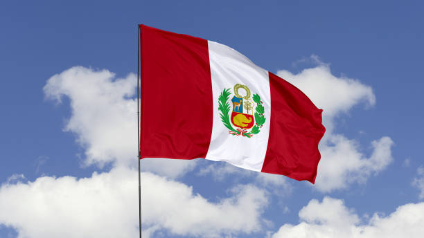 istock Peru Flag is Waving Against in the Sky. 1690859305