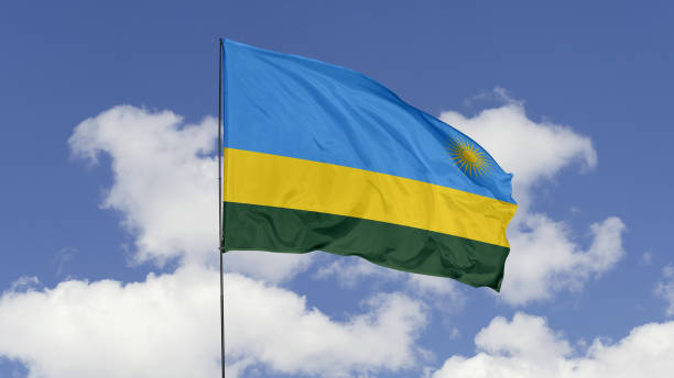 istock Rwanda Flag is Waving Against in the Sky. 1690859322