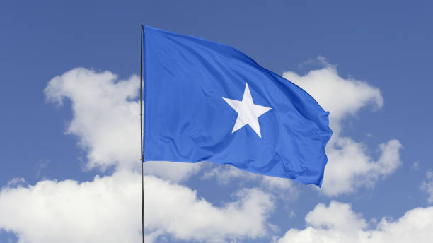 istock Somalia Flag is Waving Against in the Sky. 1690859963