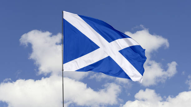 istock Scotland Flag is Waving Against in the Sky. 1690861604