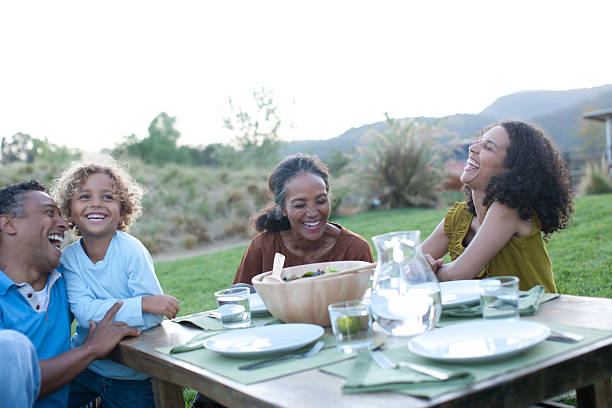 istock Family eating outdoors 169087140