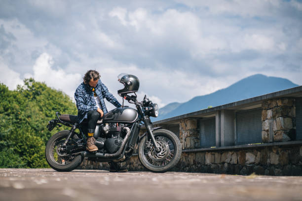He is pausing on a mountain pass in the mountains, Ticino Canton