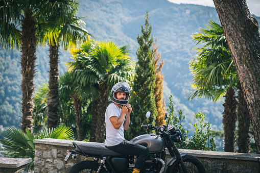 He is riding the mountain roads in Ticino Canton