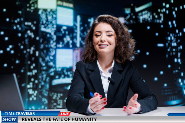 Presenter talks about fate of humanity revealed by time traveler, peculiar encounter discussed live on television program. Woman news anchor hosting night show, presenting secrets of the future.
