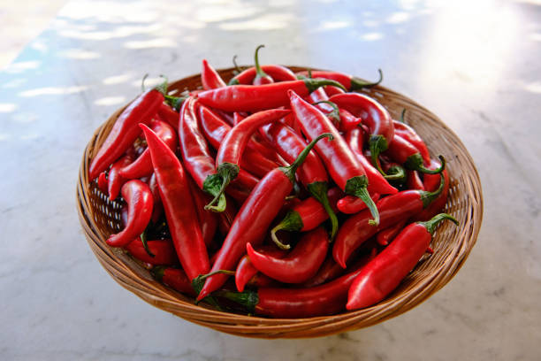 istock Red chili peppers in a basket 1690901790