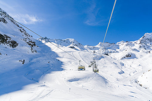 Panorama of the Kaunertal Glacier in Austria and view of the ski gondola lift.