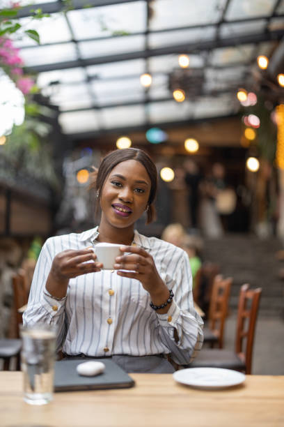 istock Beautiful woman in cafe 1690921451