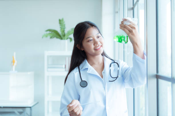 istock In the science classroom, an Asian child scientist experimenting with scientific formulas with chemicals 1690923108