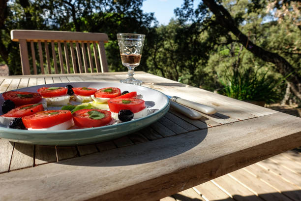 istock Table in the Garden. Plate with appetizer. 1690925347