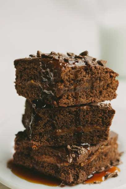 istock Brownies covered with chocolate sauce and coffee 1690926685