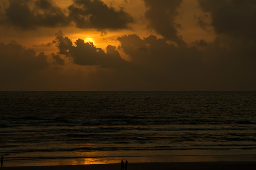 The setting sun at Ladghar beach Dapoli, on the west coast of India.