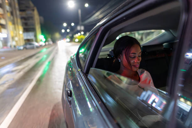 istock Black woman riding in car 1690931945