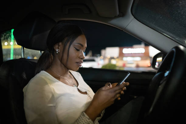istock Modern woman sitting a in car 1690934039