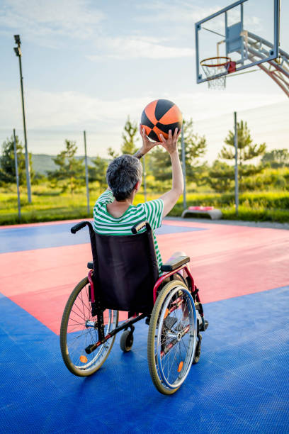 istock Disabled woman playing basket 1690937898