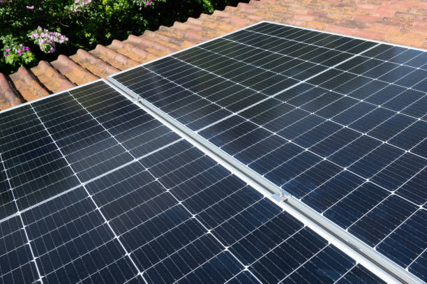 istock Solar panels on clay hosue roof 1690958210