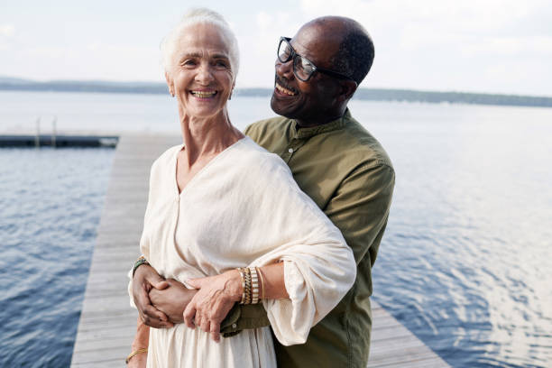 istock Senior man embracing his happy wife 1690962262