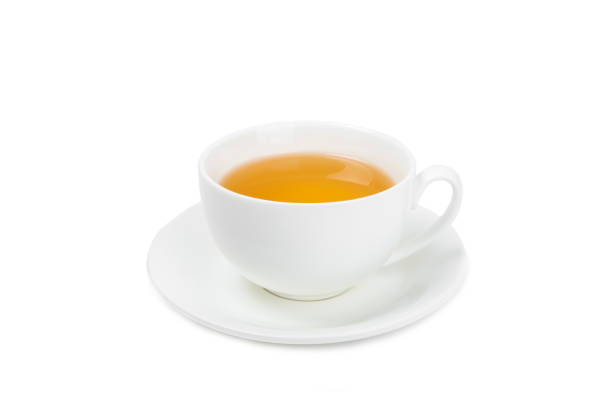 istock Chamomile herbal tea with flower buds and chamomile bouquet isolated on white background. Useful herbal, soothing drinks and natural healer concept. Immunity tea.Close up. Copy space. 1690962492