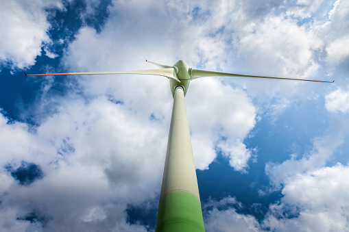 Top of a windmill with rotor blades