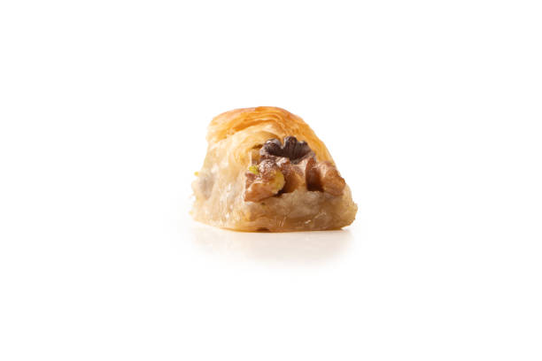 istock Delicious sweet baklava with walnuts isolated on white background. 1690983974