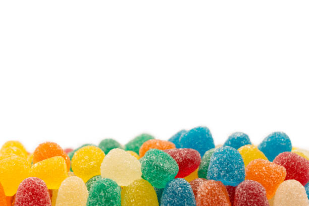 istock Assorted colorful gummy candies isolated on a white background. 1690983979