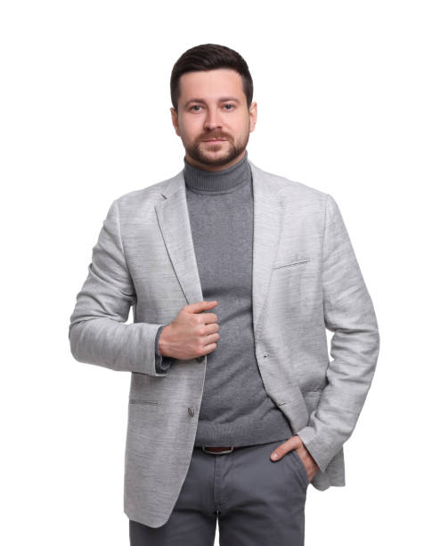 istock Handsome bearded businessman in suit on white background 1690985107