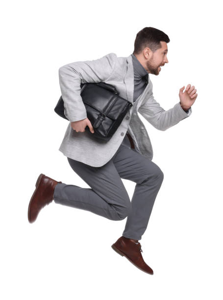 istock Handsome bearded businessman with briefcase on white background 1690985202