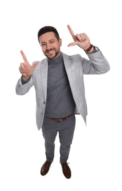 istock Handsome bearded businessman in suit on white background, above view 1690986325