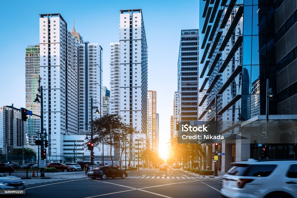 Office buildings in, Makati the business district of Metro Manila. Modern apartment building facades in Bonifacio global city in Metro Manila, Philippines. Apartment Stock Photo