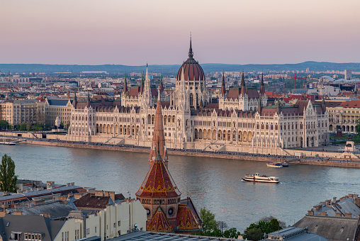 Budapest, Hungary - April 23, 2023: A picture of the Hungarian Parliament Building at sunset.