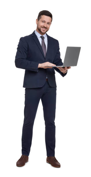 istock Handsome bearded businessman in suit with laptop on white background 1691001888