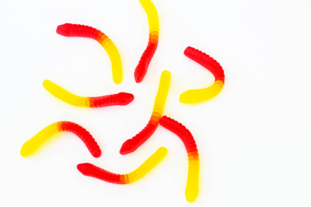 istock Sweet jelly worms on a light background 1691014082