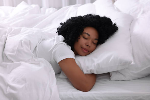 istock Beautiful young woman sleeping in soft bed 1691018834