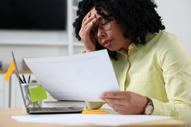 istock Deadline concept. Stressed woman holding document in office 1691034772