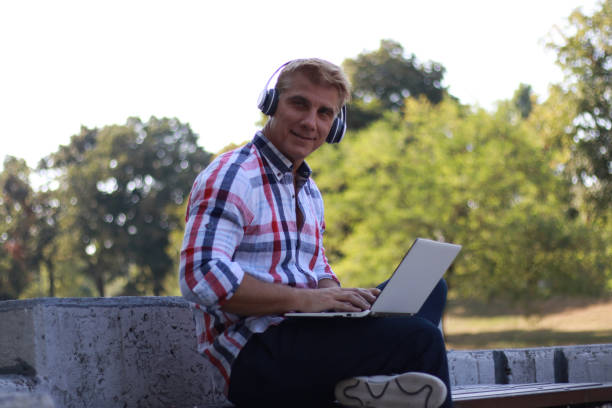 istock Mid aged man working and relaxing in nature 1691057400