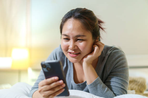 istock Woman relaxing in bedroom 1691058325