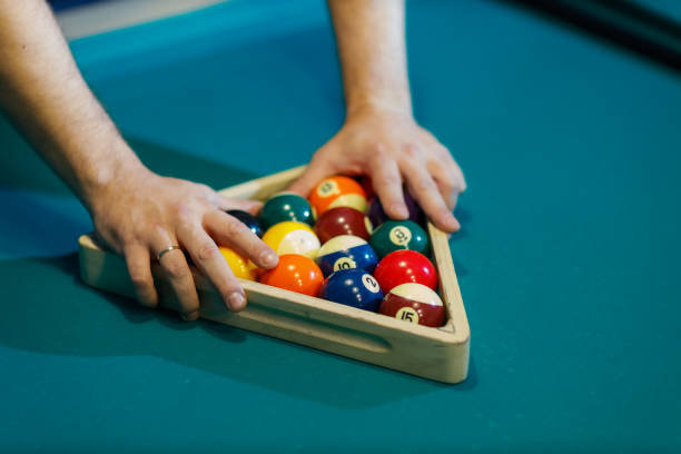 istock Billiard player at billard table or snooker american billiards pool sport game 1691061525