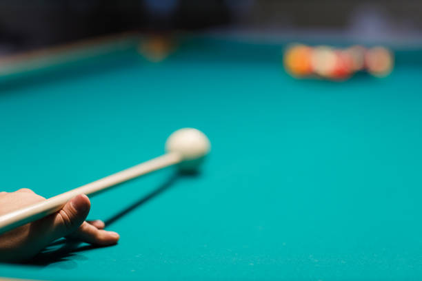 istock Billiard player at billard table or snooker american billiards pool sport game 1691061533
