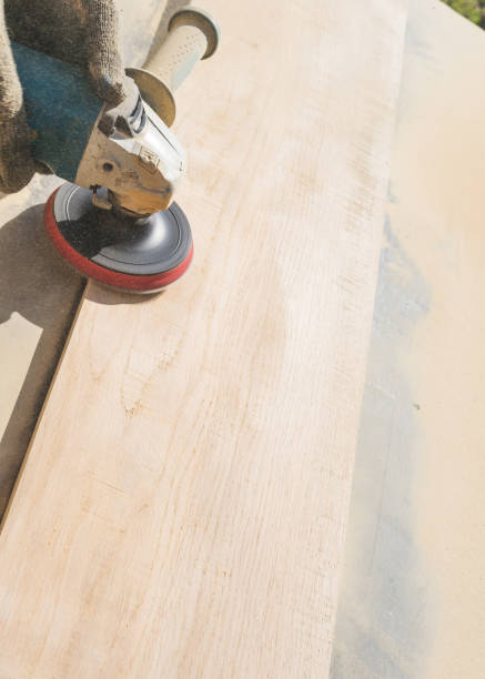 istock Grinding of an oak board with an angle grinder 1691064407