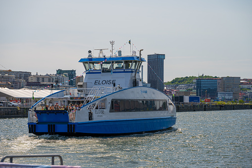 Gothenburg, Sweden - June 03 2023: Hybrid electric passenger ferry Eloise crossing the river.