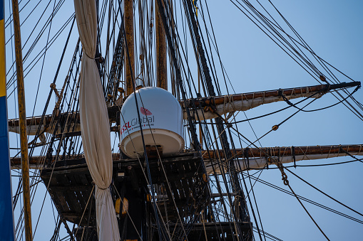 Gothenburg, Sweden - June 03 2023: Mast of east indiaman replica Gotheborg with modern communications antennae.