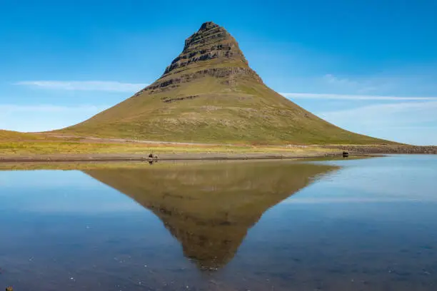 Dramatic view of the Kirkjufell mountain, GrundarfjÃ¶rÃ°ur on the northshore  of the SnÃ¦fellsnes peninsula in the west of Iceland.