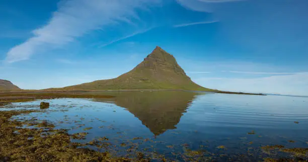Dramatic view of the Kirkjufell mountain, GrundarfjÃ¶rÃ°ur on the northshore  of the SnÃ¦fellsnes peninsula in the west of Iceland.