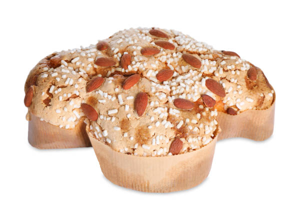 istock Delicious Italian Easter dove cake (Colomba di Pasqua) decorated with sugar and almonds on white background 1691069352