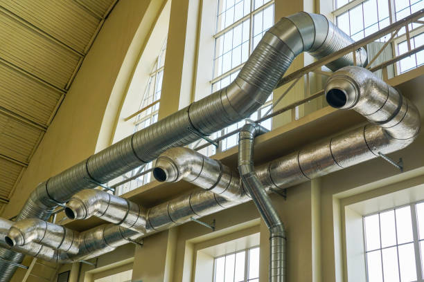 istock Thermally insulated elements of the ventilation and heating system in a large hangar 1691077229